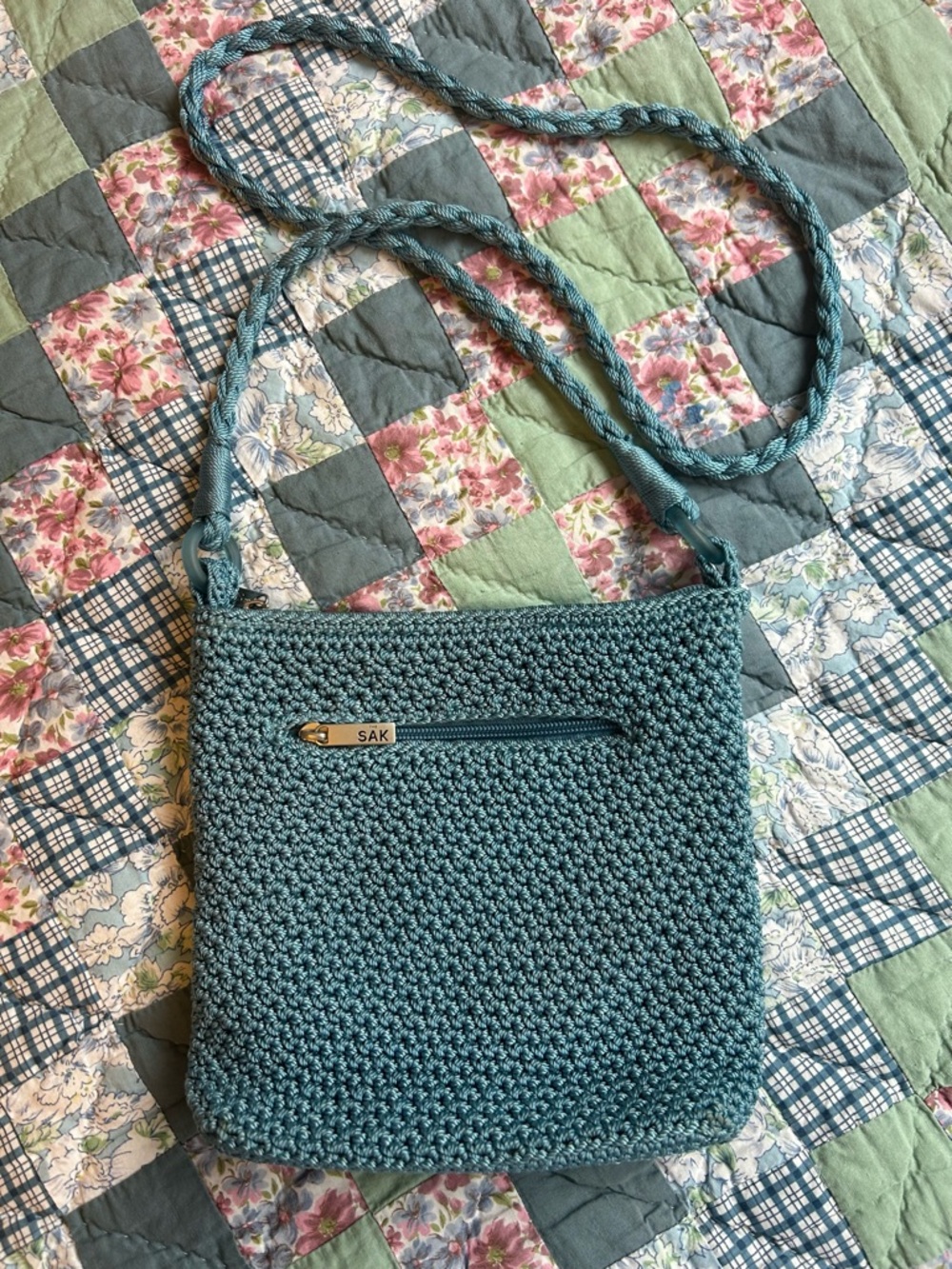 The Sak Teal Crochet Crossbody Bag with Braided Strap